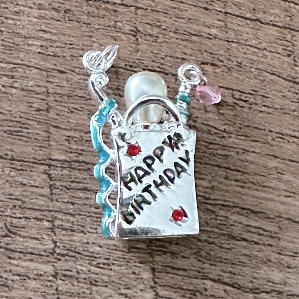 Sterling Silver Detailed Happy Birthday Gift Bag Charm with 4 Ruby Birthstones.